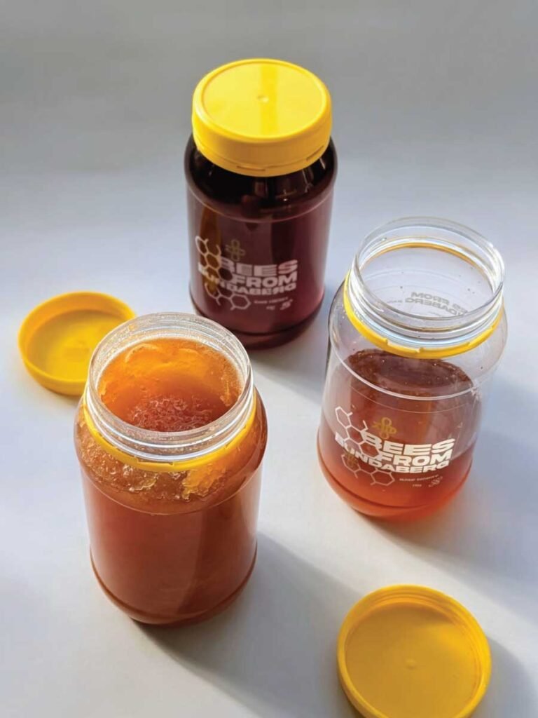 Two jars of crystallized honey