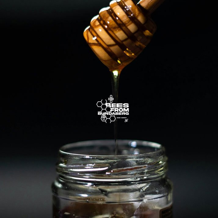 Drizzling Raw Honey from Bundaberg Raw honey dripping from a spoon
